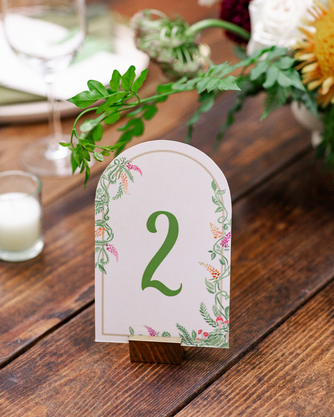 Whimsical table numbers for weddings