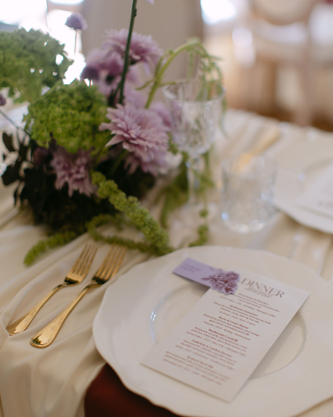wedding dinner menu and place card on elegant tablescape