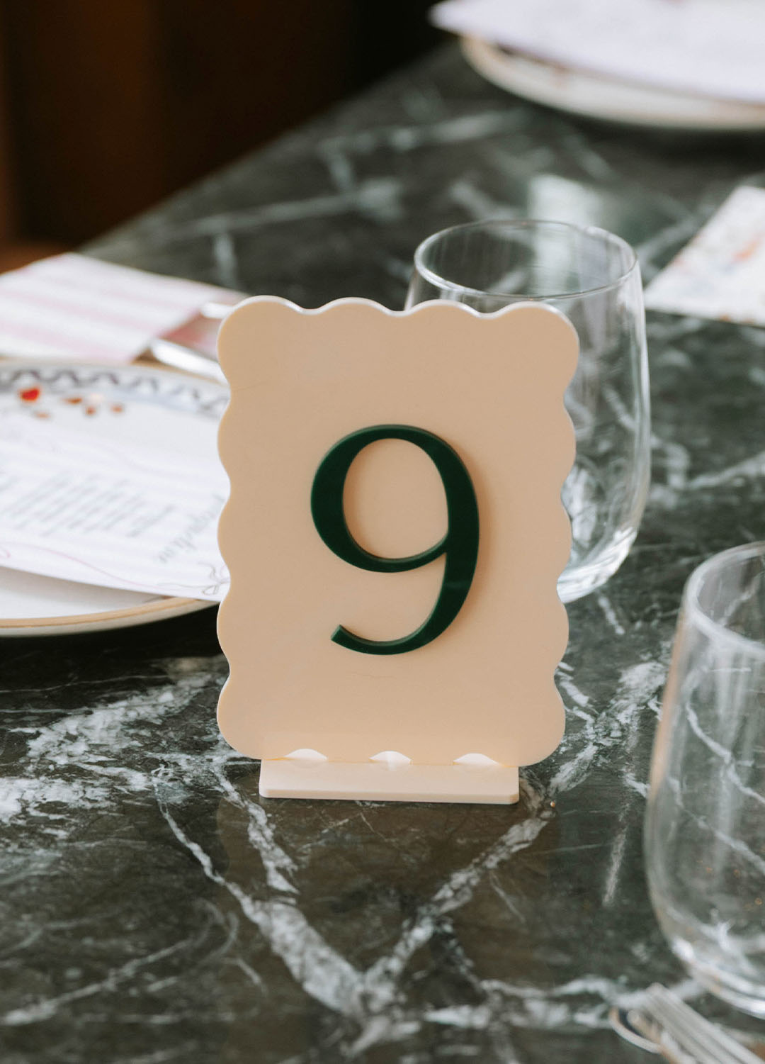 Wedding table number made of acrylic and wavy edge